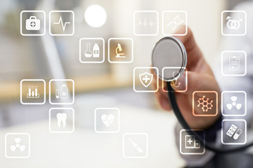 Medical icons on virtual screen. Modern technology in medicine.