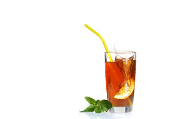 Splashes from a slice of lemon diving into the iced tea.