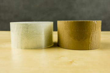 Transparent and brown adhesive tape.