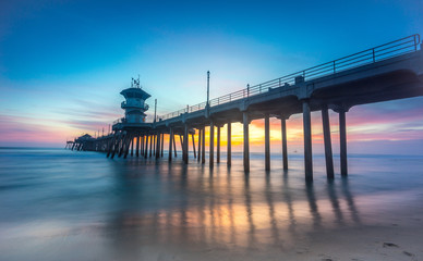 Obraz premium Huntington Beach o zachodzie słońca