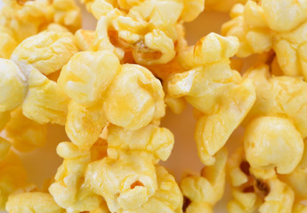 Texture of Caramel Popcorn, Top View, Selective Focus, Blur Background