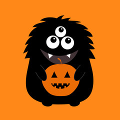 Black monster silhouette holding pumpkin. Cute cartoon scary funny character. Baby collection. Three eyes, fang tooth, big tongue, hands. Orange background. Isolated. Happy Halloween card. Flat design