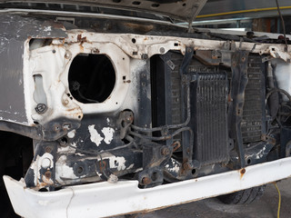 Fototapeta premium Old and dirty diesel fuel system car radiator in the garage.