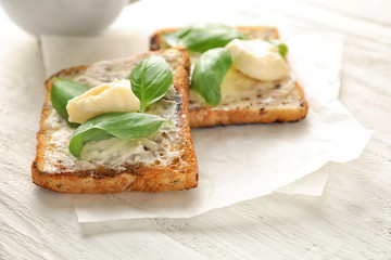 Toasted bread on wooden table