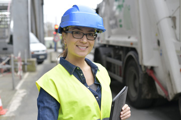 Industrial engineer controlling recycling work with tablet © goodluz