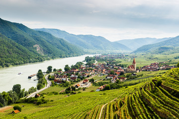 Scenic View into the Wachau with the river Danube and town Weissenkirchen in Lower Austria.