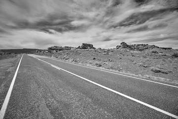 Black and white picture of a desert road, Capitol Reef National Park, Utah, USA.