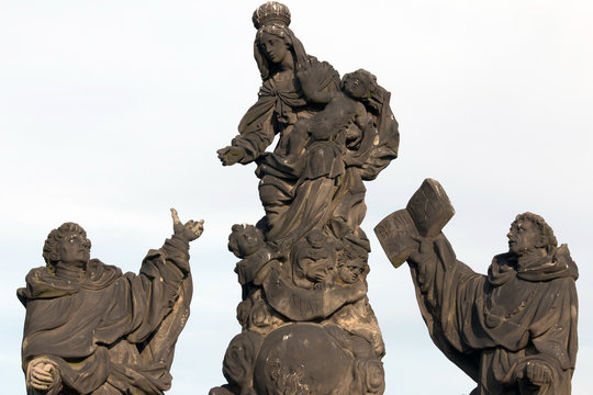Baroque statues of Madonna, Saint Dominic and Thomas Aquinas on Charles Bridge
