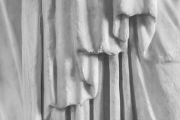 Detail of stone sculpture - draped clothing