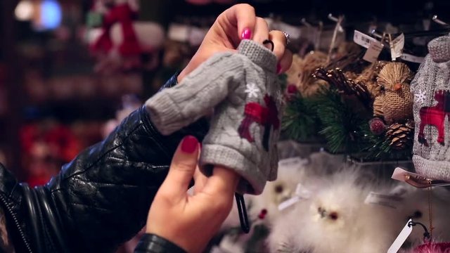 Beautiful Woman Buying Christmas Decorations For Family In The Store , Portland Oregon, USA, Christmas Shopping, Close Up, Hands