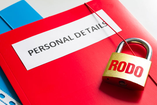 Rodo personal data protection with padlock and personal details concept
