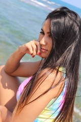 Beautiful woman posing at the beach