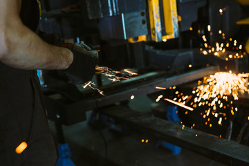 Man work with welding instruments.