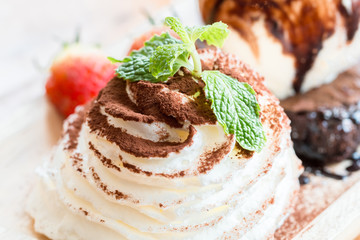 Brownies and ice cream in wood bowls to creative for design and decoration isolate on background.Copy space.
