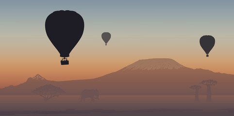 Naklejka premium Balon na ogrzane powietrze - góra - Kilimandżaro - ucieczka - wolność - spokój - zachód słońca - sawanna