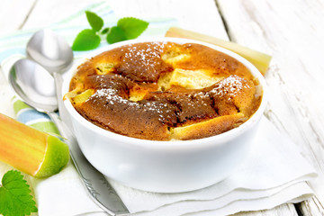Klafuti with rhubarb in bowl on board
