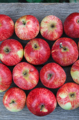 Sweet fresh ripe red apple harvest background