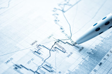 Showing business and magnifying glass