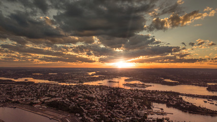 Fototapeta na wymiar Sunset from high above the sky overlooking a city