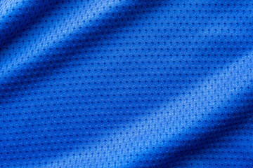 Blue color fabric sport clothing football jersey with air mesh texture background