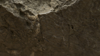 In the piece of rock, the barely visible minerals of the minerals are visible.