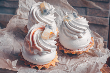 Confectionery product on paper for baking close-up, selective focus, trend toning