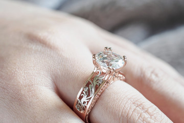 woman hand with jewelry diamond ring on finger