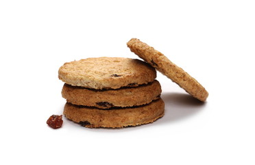 Round wholewheat biscuits with raisins isolated on white background