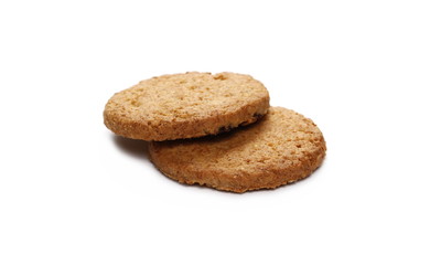 Round wholewheat biscuits with raisins isolated on white background