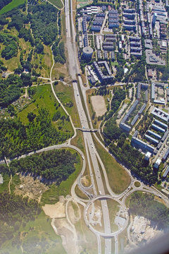 Freeway and roundabout pattern with traffic aerial