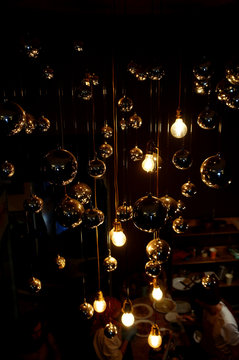 Light bulbs on wires in the dark