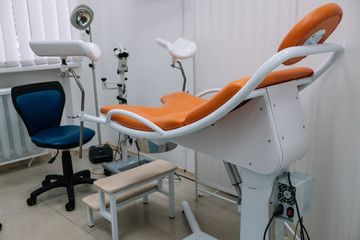 Workplace gynecologist. Gynecological chair, Doctor's chair, Medical lamp, Colposcope with video system