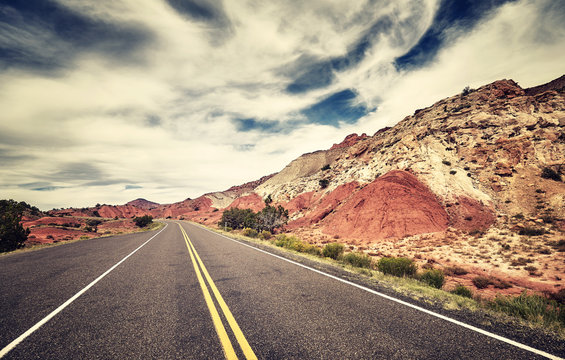Retro toned picture of a scenic road in the Capitol Reef National Park, Utah, USA.