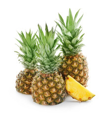 Fototapeta premium Delicious pineapples on white background