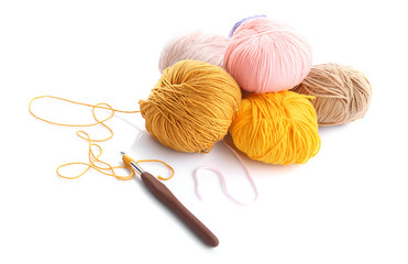 Colorful knitting yarn with crotchet on white background