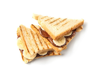 Toasted bread with chocolate paste  and sliced banana on white background