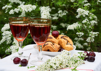 Lunch with red wine and croissants outdoor