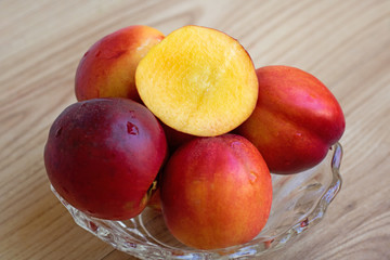 Fototapeta na wymiar Peaches in bowl - summer fruit