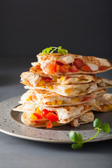 mexican quesadilla with chicken, tomato, sweet corn and cheese