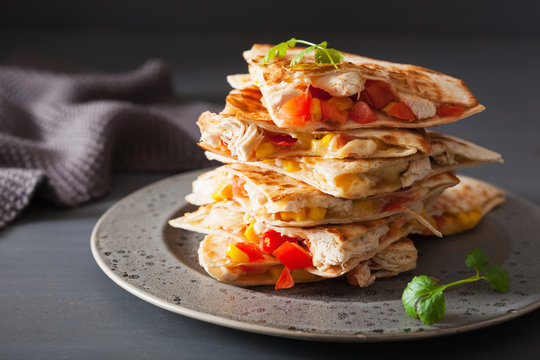 mexican quesadilla with chicken, tomato, sweet corn and cheese