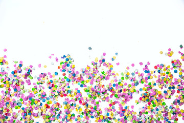 Confetti with copy space on a white background