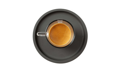 Espresso coffee on black saucer isolated on a white background, top view