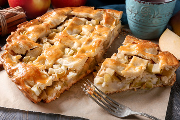 Tasty homemade apple pie on parchment