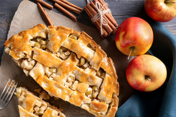 Tasty homemade apple pie on wooden table