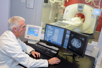 MRI technologist monitoring the screen