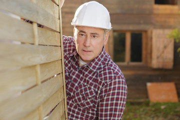 Fototapeta premium contractor handyman builder outdoors