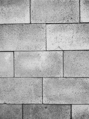 Concrete tiles wall texture background. Vertical photo.