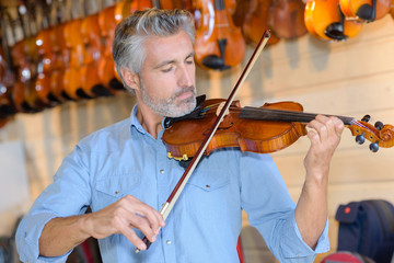 tuning the violin