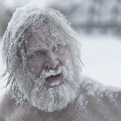 Portrait of a bearded man in the snow