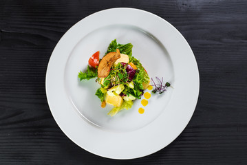 Vegetable salad on wooden background